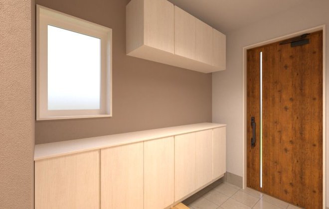 【玄関ホール】壁面いっぱいに設置された棚に、靴や小物をたっぷり収納可能。木目調のドアとナチュラルな内装が温かみのある空間を演出。採光窓からの自然光で、明るく清潔感のある空間に。※画像はイメージパースです